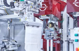 Packing machines for valve bags